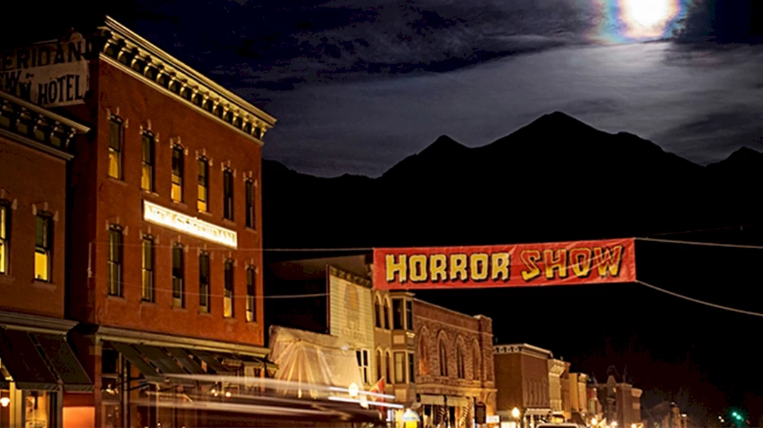 town of Telluride at night with a banner across the main street for Telluride Horror Show
