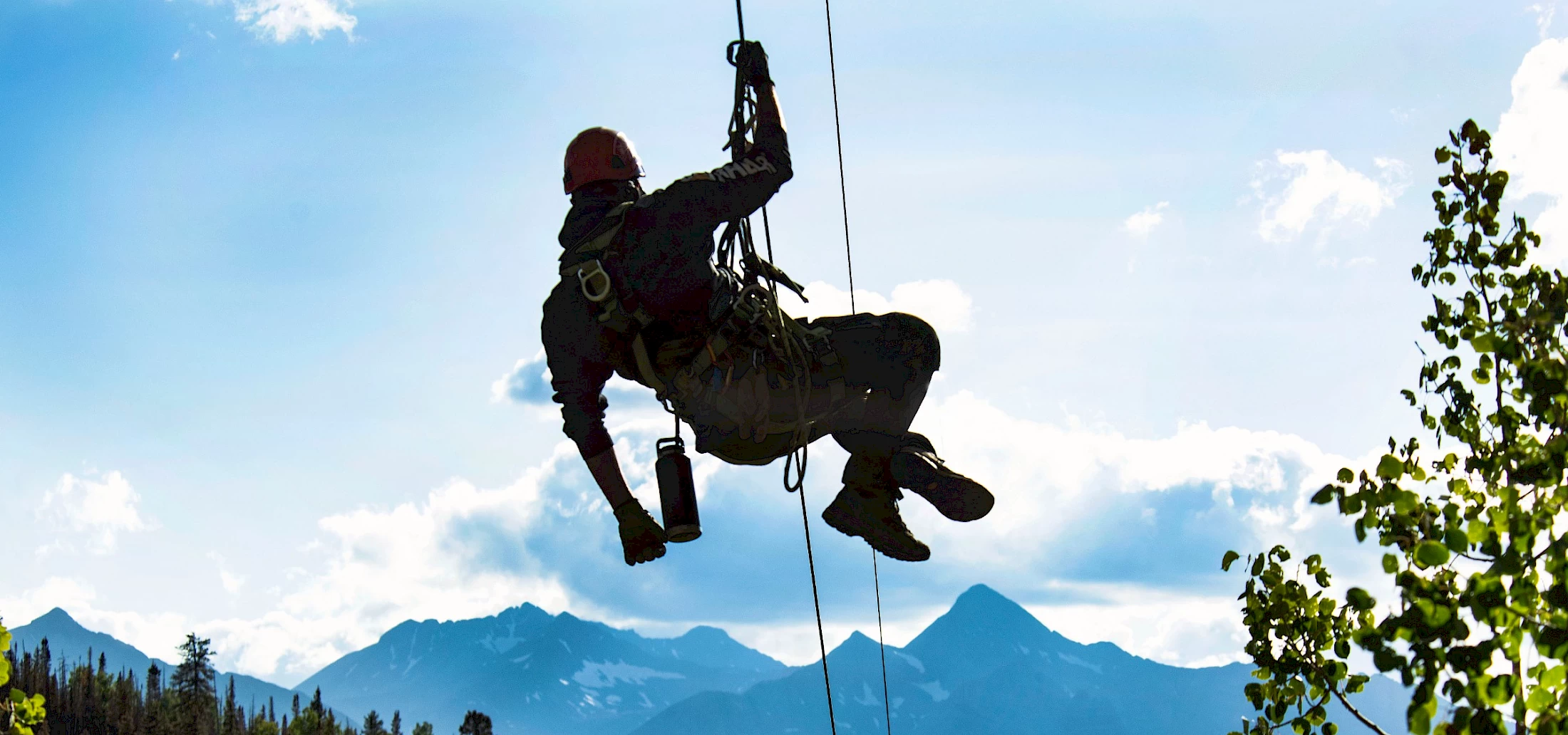 image of a person on a zip line | Telluride